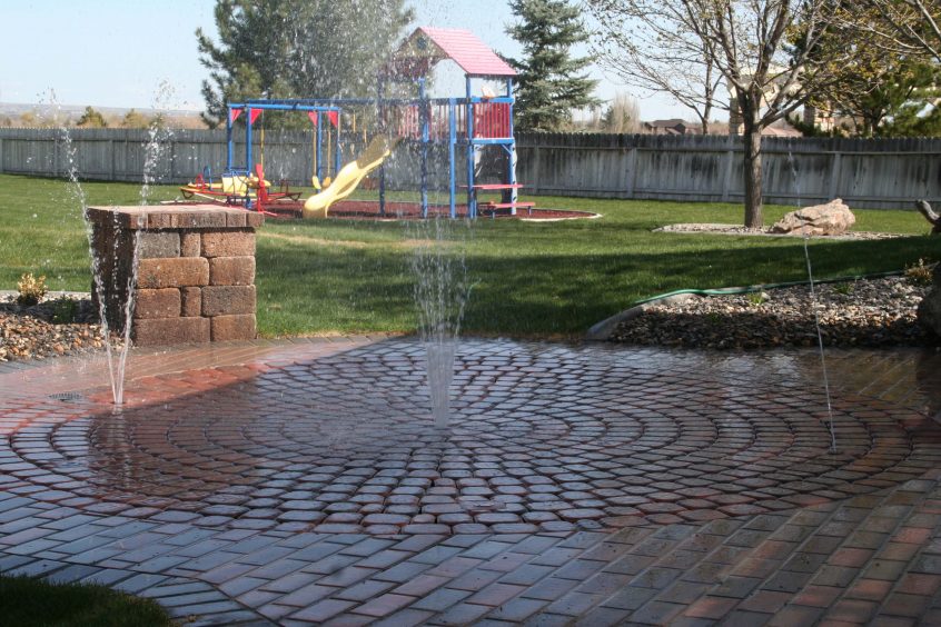 Sprinkler patio feature planned as a part of a residential landscaping project in Twin Falls, ID
